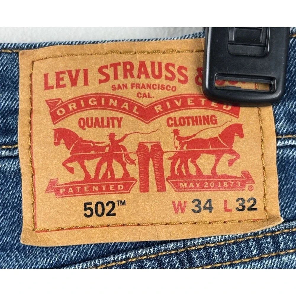 Levi's 502 Jeans Mens 34x32 Blue Medium Wash Slim Tapered Denim Zip Fly 5 Pocket